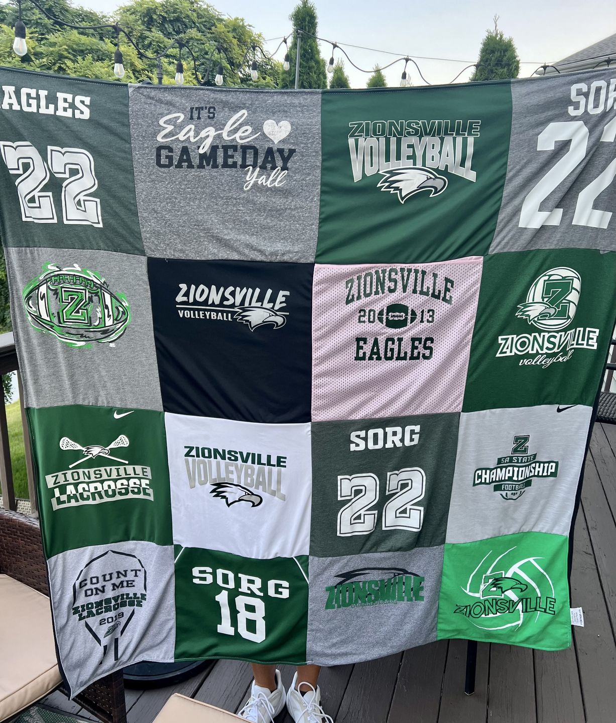 Custom t-shirt quilt with college and high school shirts — perfect graduation gift from Project Repat