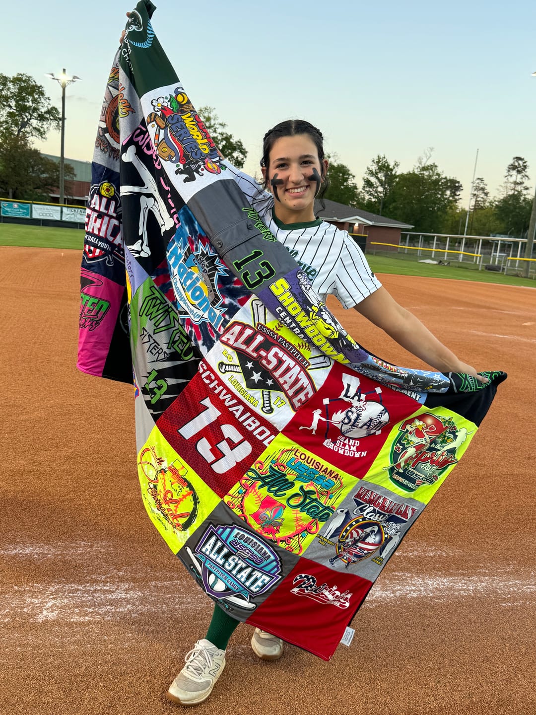 Custom graduation quilt made from college t-shirts with university logos — Project Repat USA made