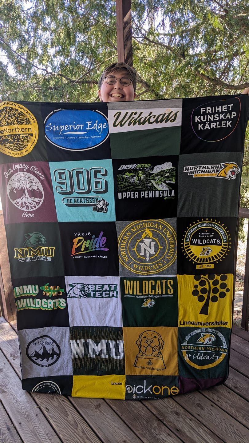 Large custom t-shirt quilt graduation gift with sports and school memories — handmade in North Carolina